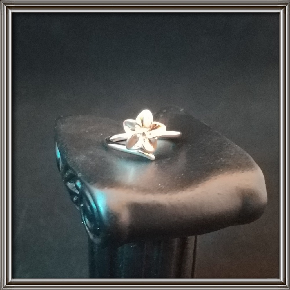 Two toned, silver & rose gold plumeria ring.